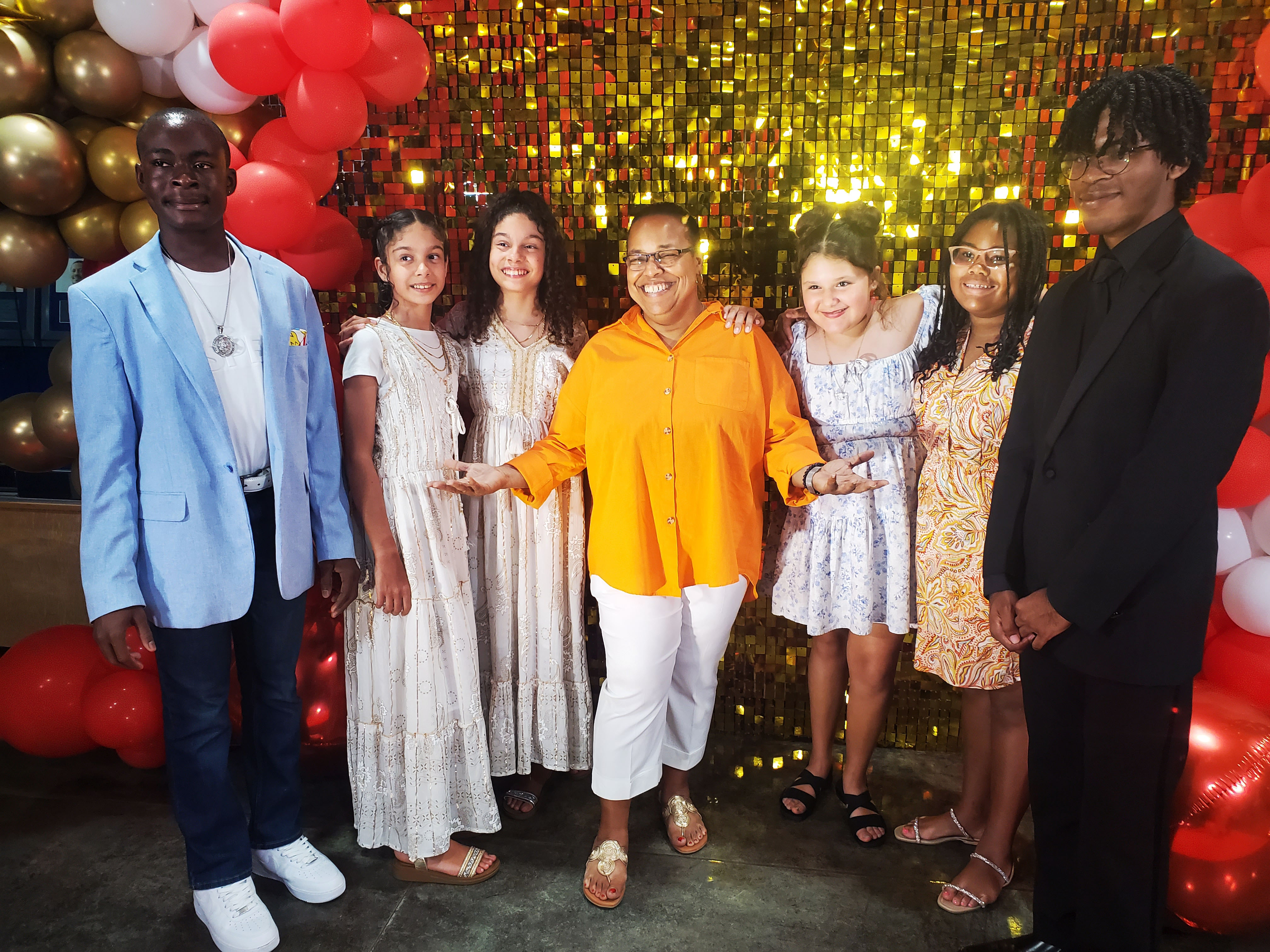 “Participants of UVI’s Youth Moviemaking Workshop pose with Reichhold Center for the Arts Director Denise Humphrey during the premiere of The Fearkeeper.”