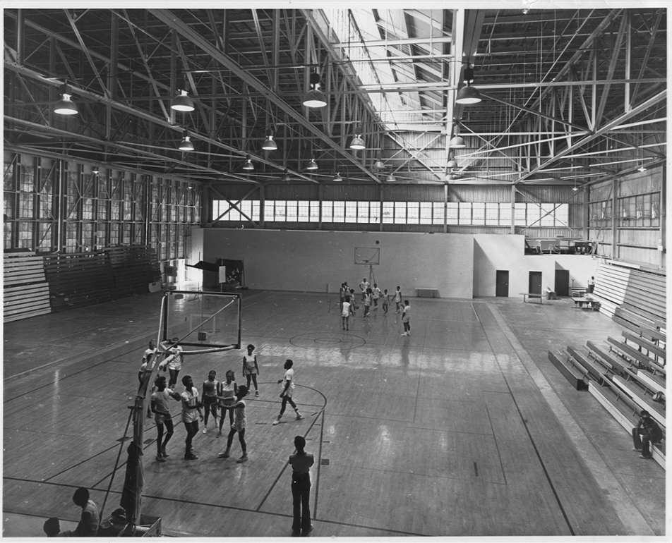 Students playing basket ball in the old CVI gym 