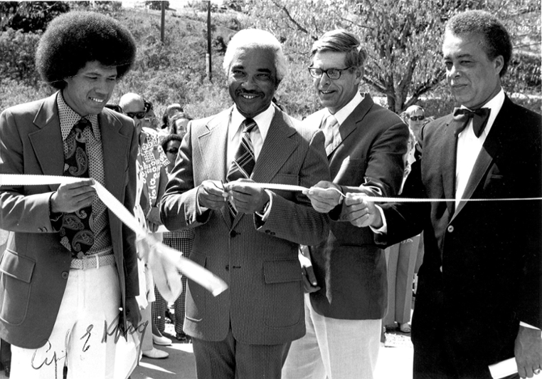 CVI Presidents Arthur Richards and Lawrence Wanlass and others cutting the ribbon at a ceremony
