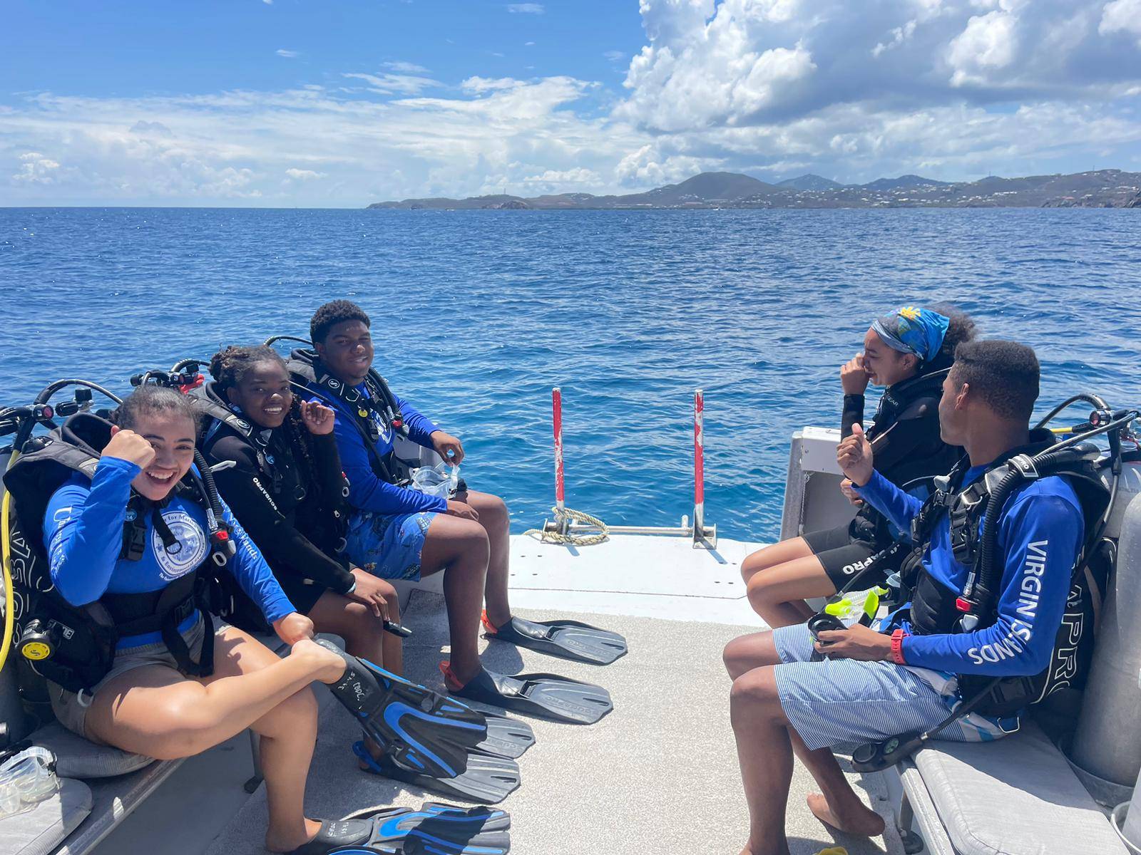 Students on a boat getting ready for a dive